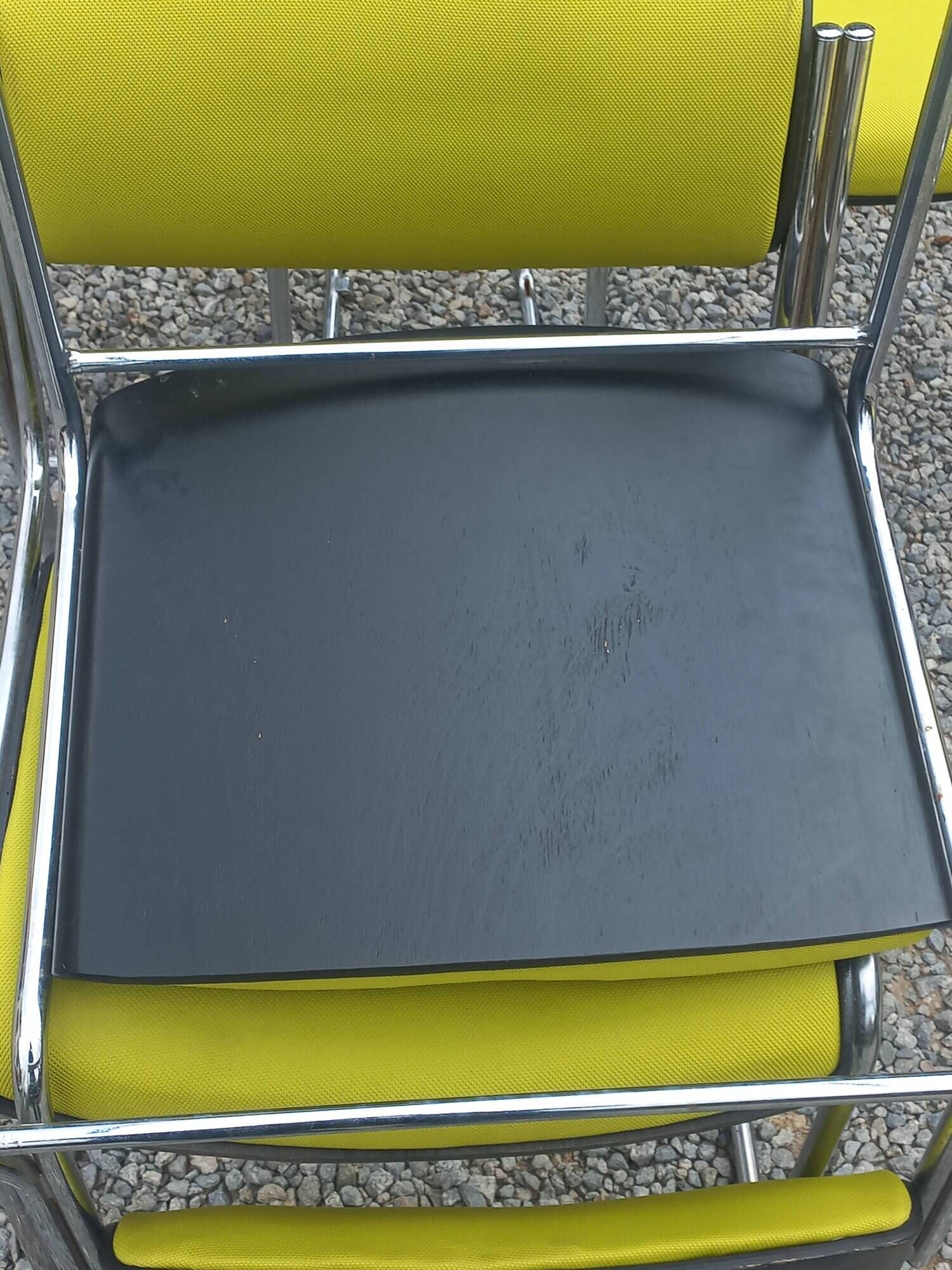 Set of 6 designer chairs with wooden seats and backs, chrome legs.