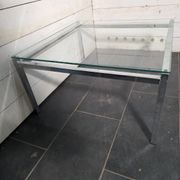 Chrome metal coffee table with a glass top from the 1970s.