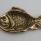 Empty bag brass fish England