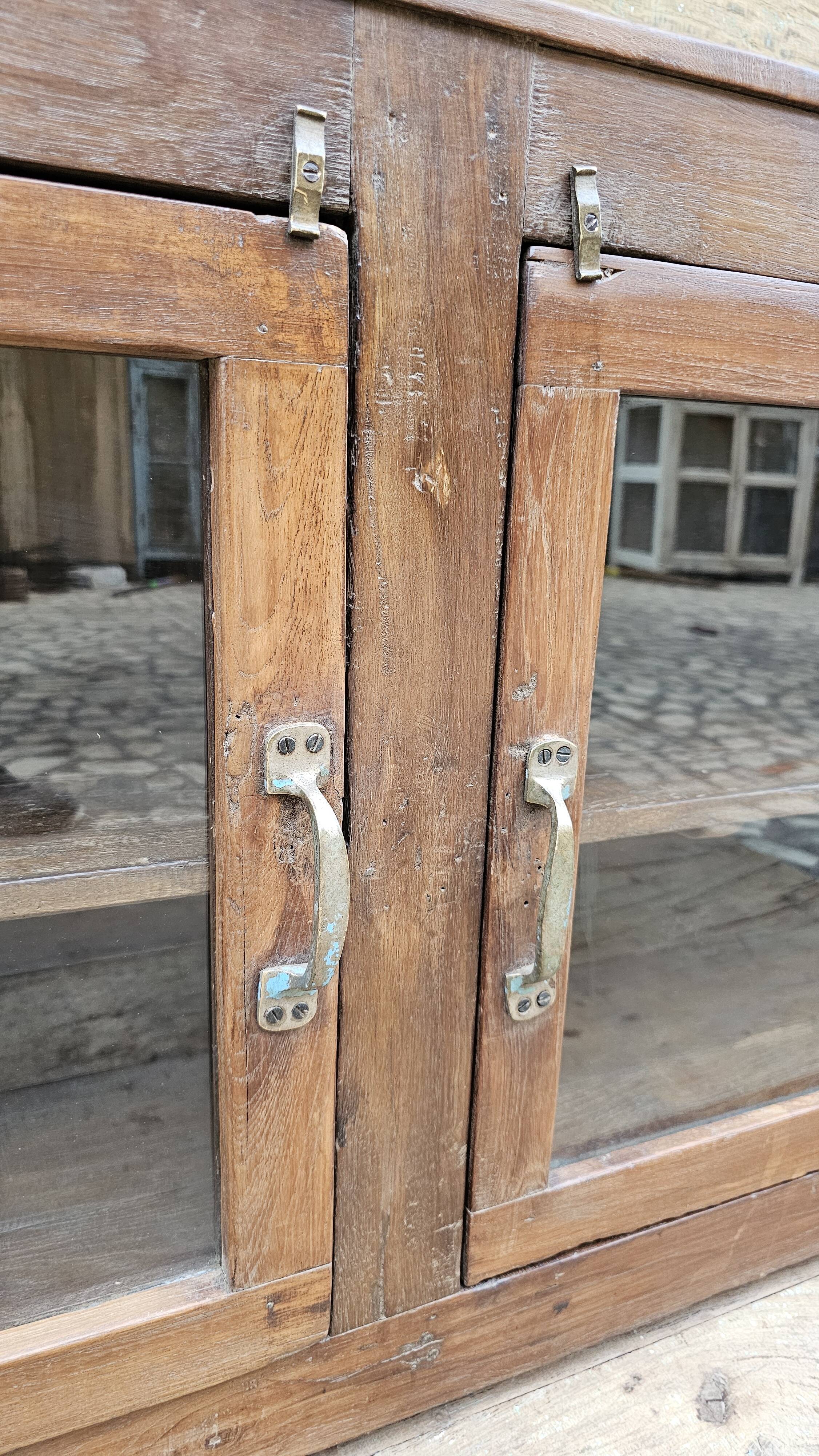 Buffet - glass TV cabinet in Burmese teak