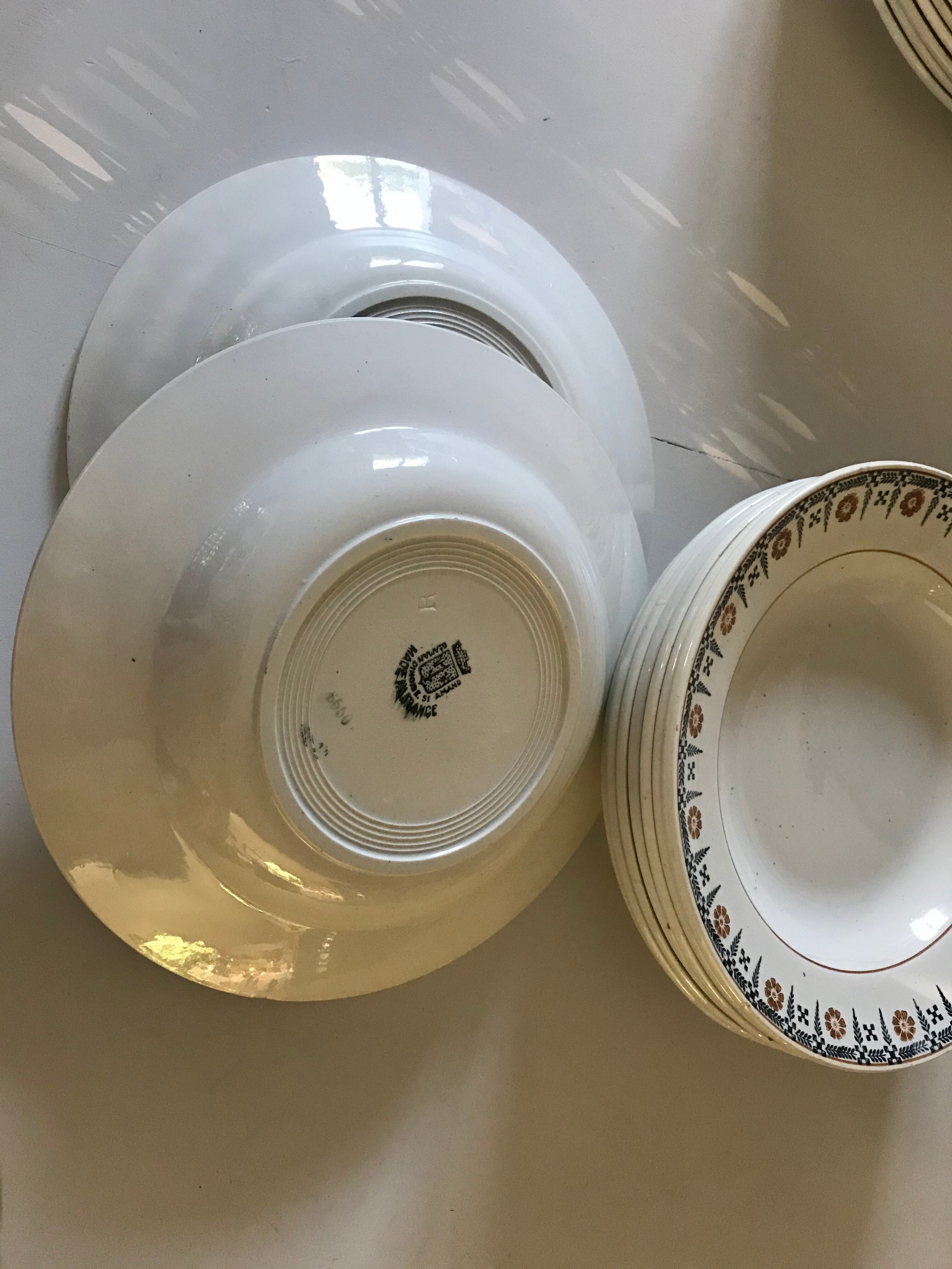 Set of 9 Saint Amand hollow plates