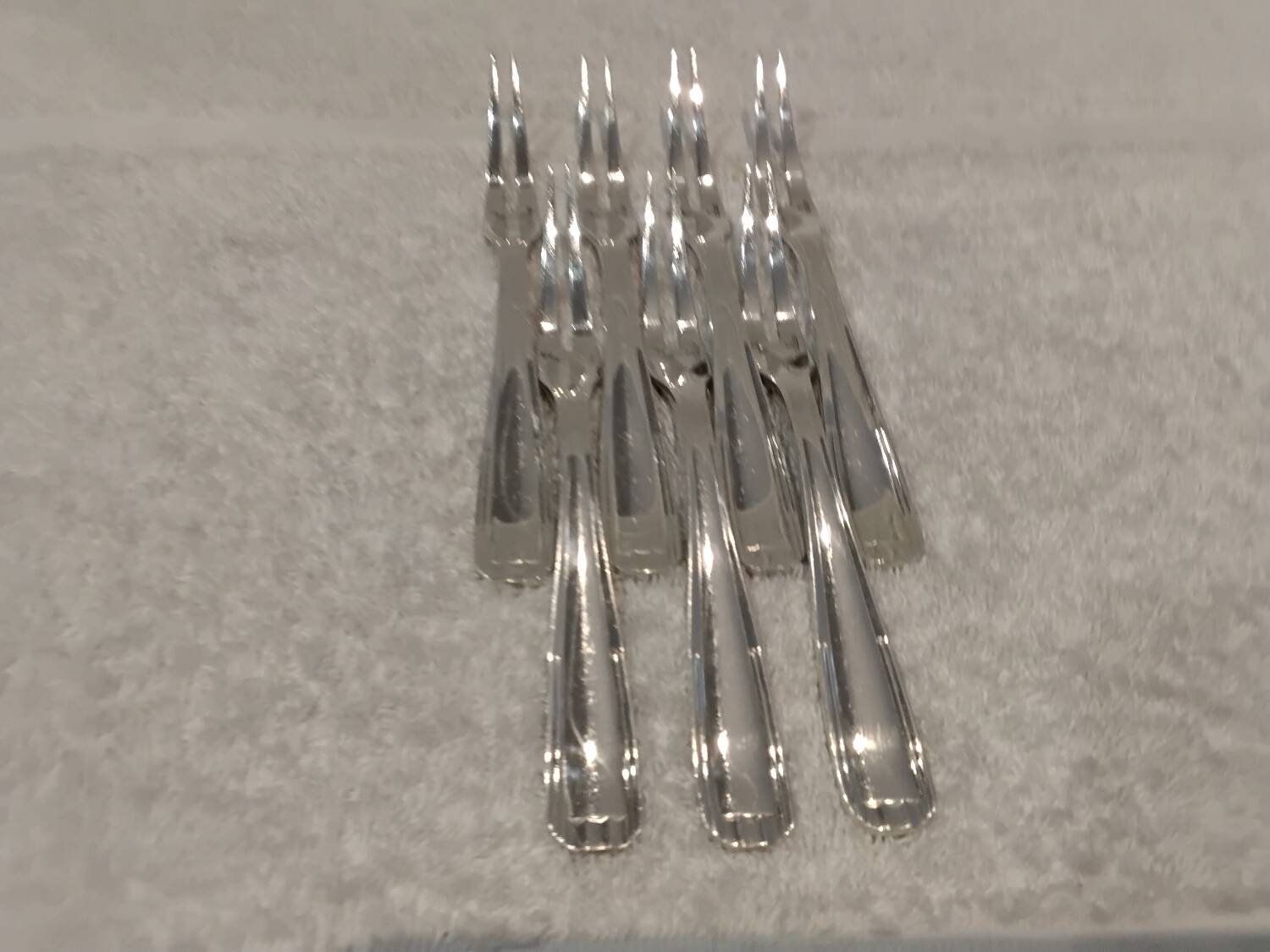 7 silver-plated metal snail forks by silversmith Alfenide, Paris pattern