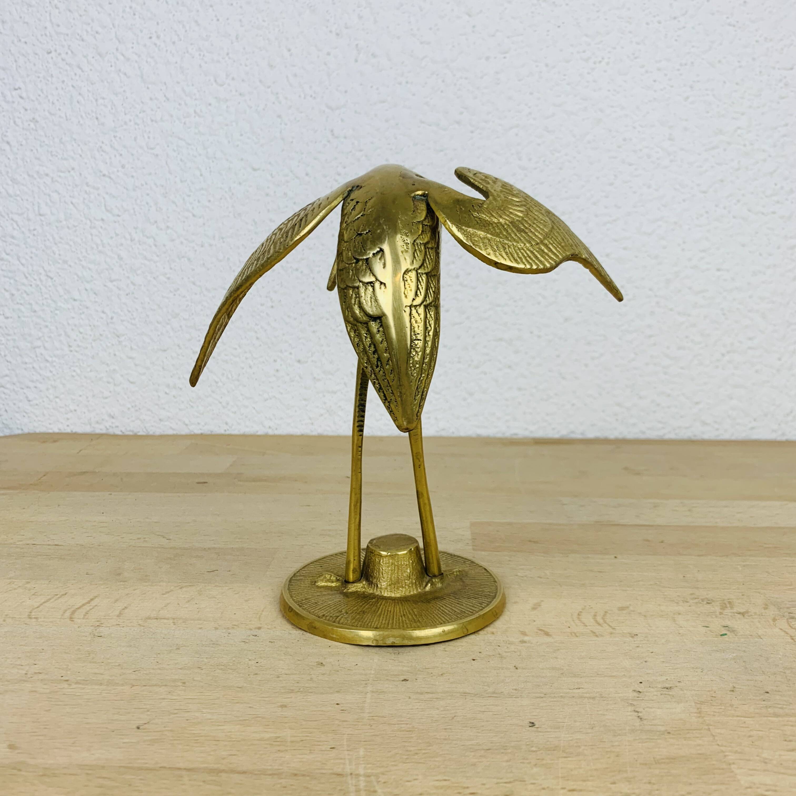 Vintage golden brass heron