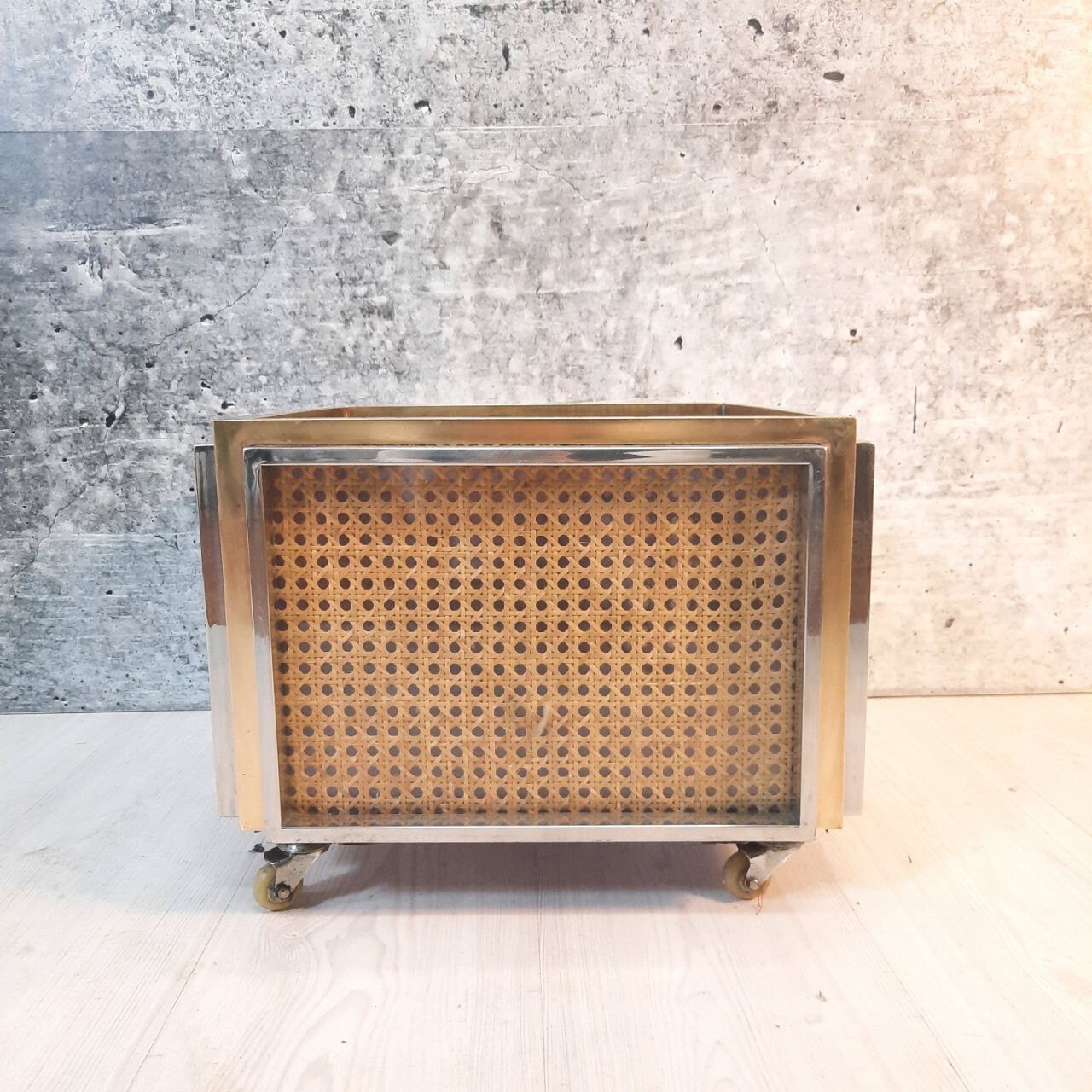 Planter, vintage storage with lightweight wheels, straw, brass and steel, hollywood regency