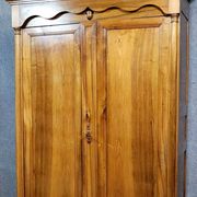 Empire period wardrobe, made of solid walnut, dating from the early 19th century.