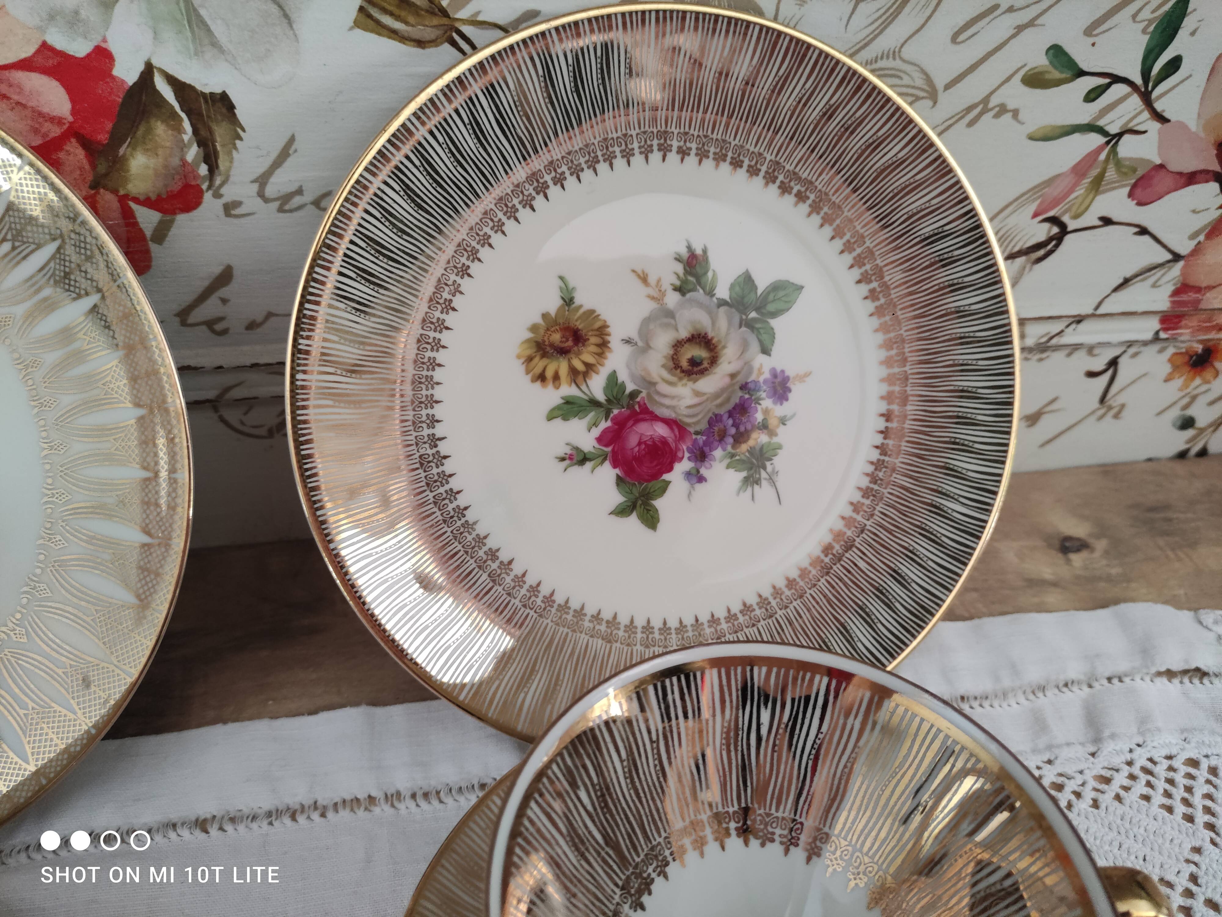 Head to head in porcelain Bavaria 6 pieces floral decoration and gilding