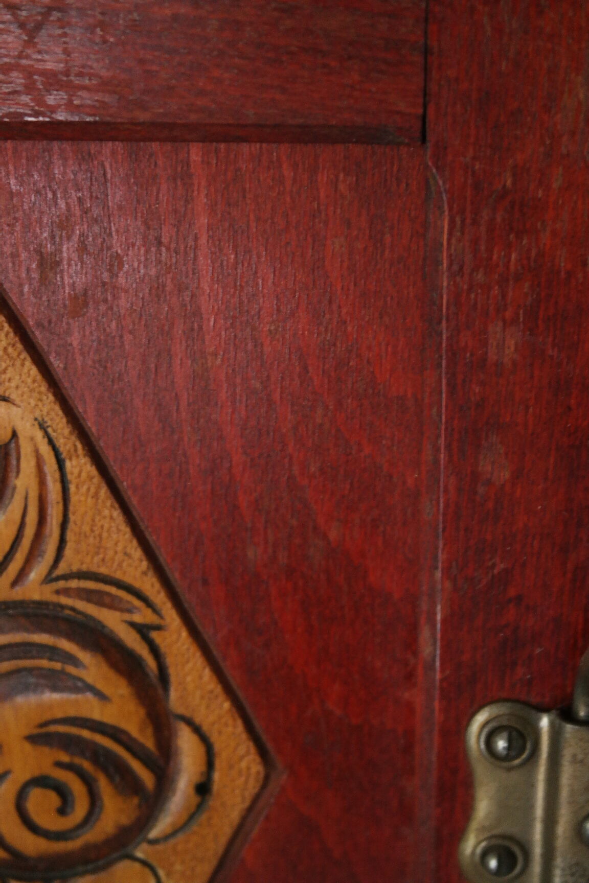 Red wooden wall-mounted coat rack and Art Deco mirror