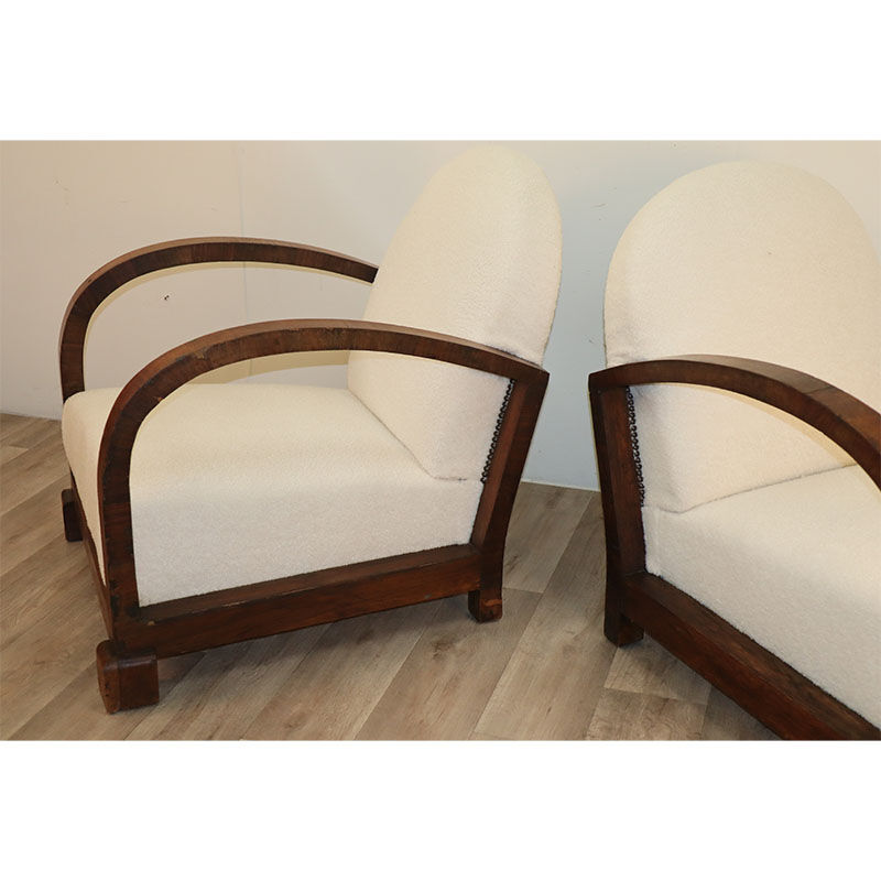 Pair of modernist armchairs in wood and buckle fabric, 1940
