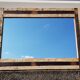 Rectangular mirror in polychrome wood