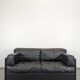Black leather convertible sofa with goose feather upholstery.