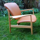 2 "The French Chair" seats by designer Finn Juhl and 1 matching footrest.