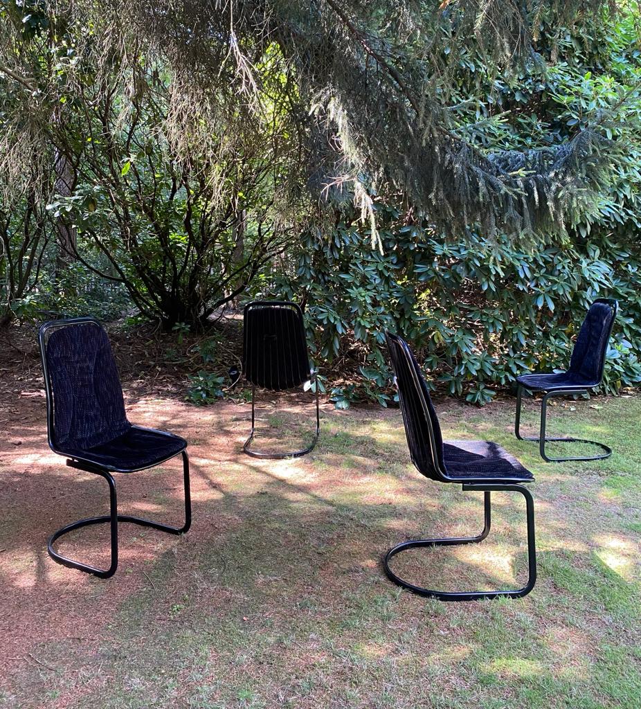 Set of four black highback dining chairs,  1970s