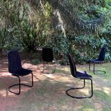 Set of four black highback dining chairs,  1970s