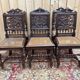 6 High Era chairs in carved solid oak and rattan caning.