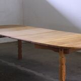 Vintage Danish brutalist oval extendable oak dining table in the style of Henning Kjærnulf, 1960s