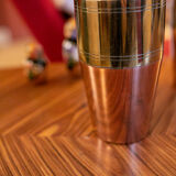 Copper vase forms a shaker