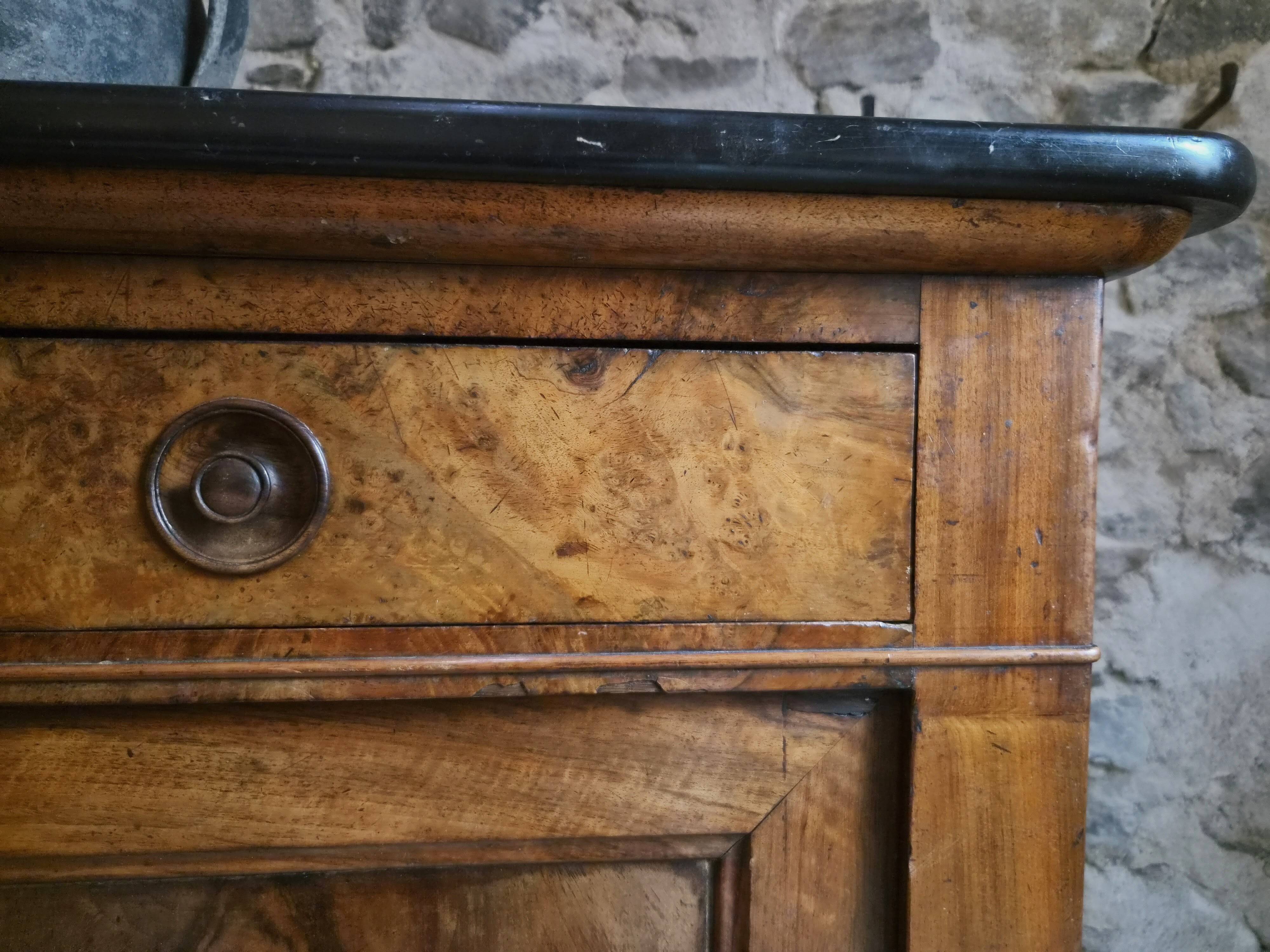 French Louis Philippe walnut buffet with black marble top, France, circa 1840–1860.