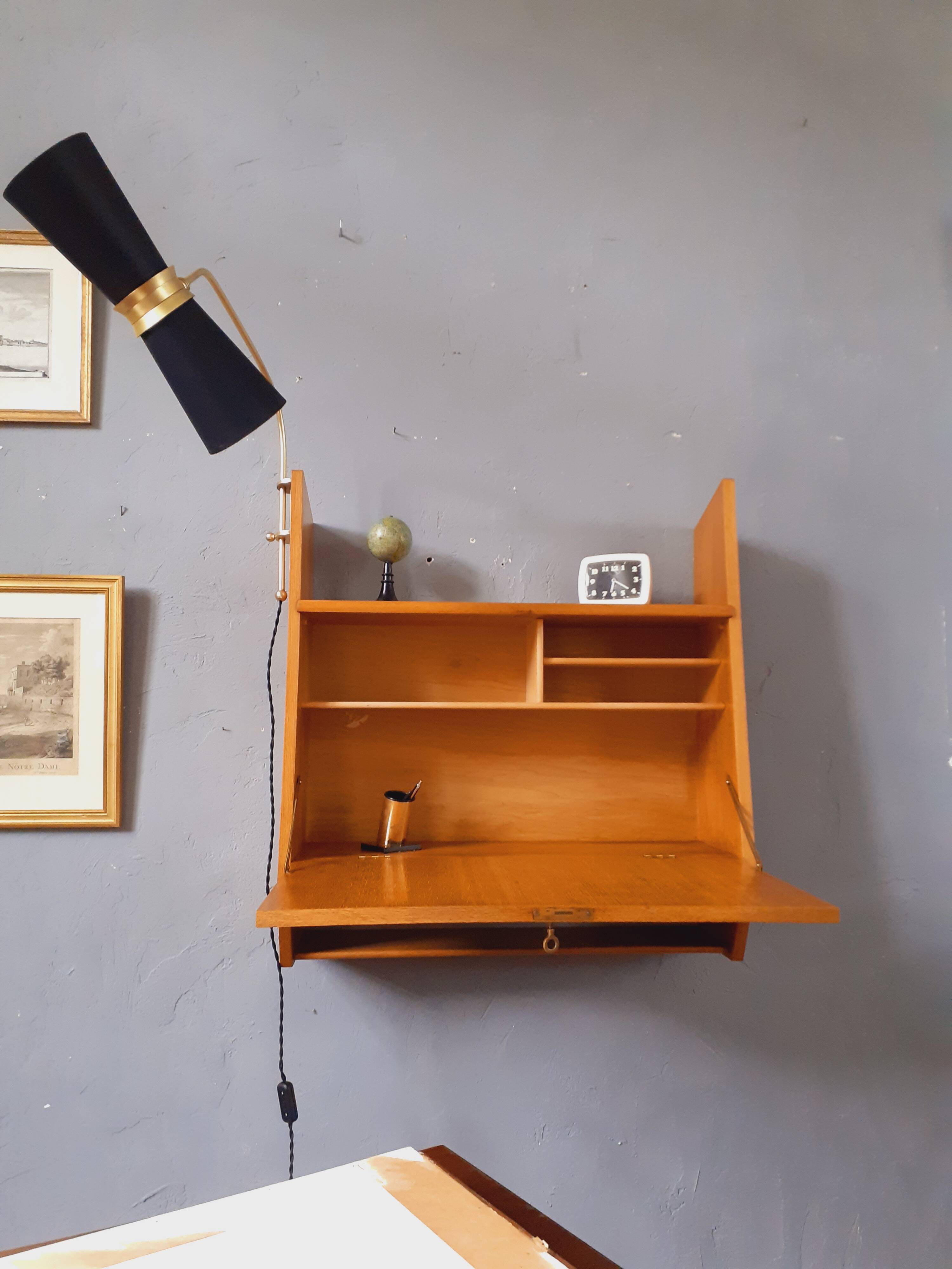 Wall-mounted oak desk from the 1950s.