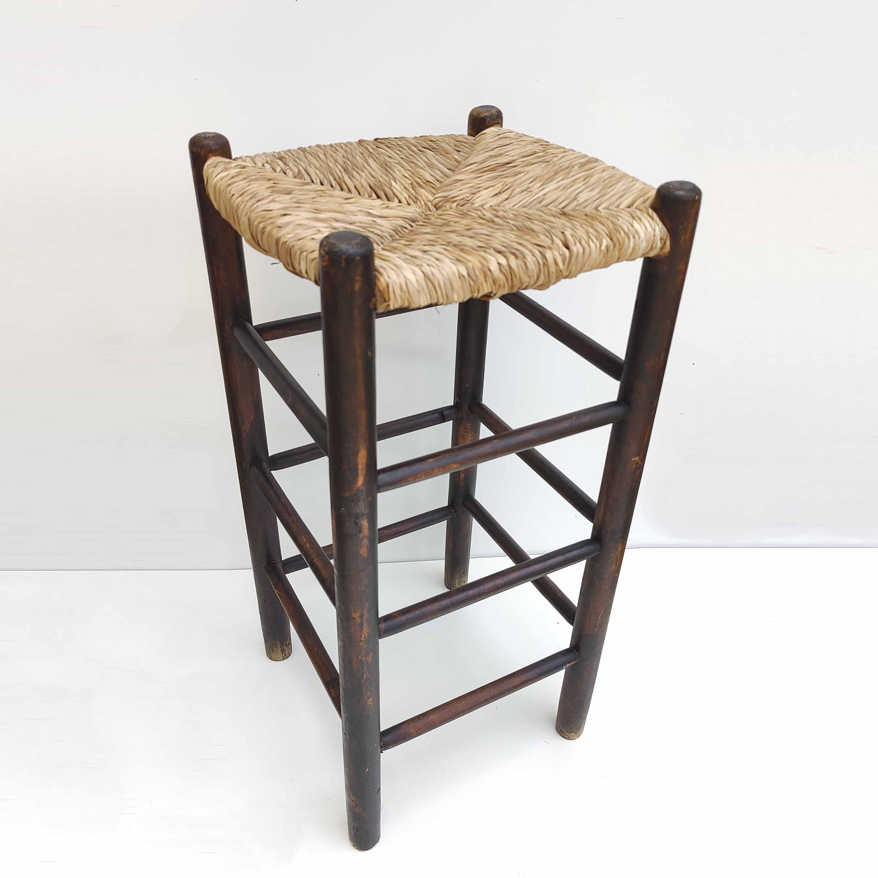 Blackened wooden bar top stool with mulched seat