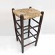 Blackened wooden bar top stool with mulched seat