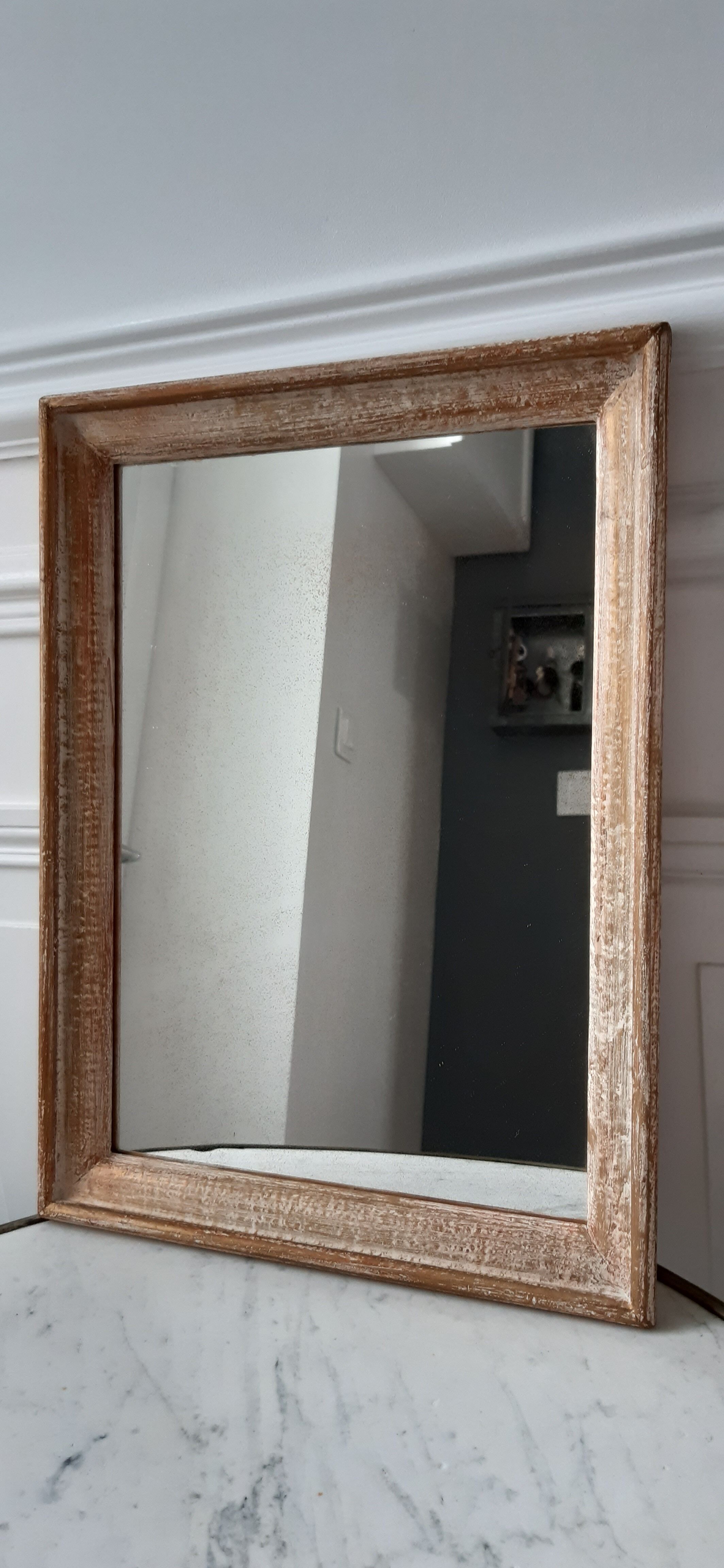 Mirror to be placed or hung in gilded wood