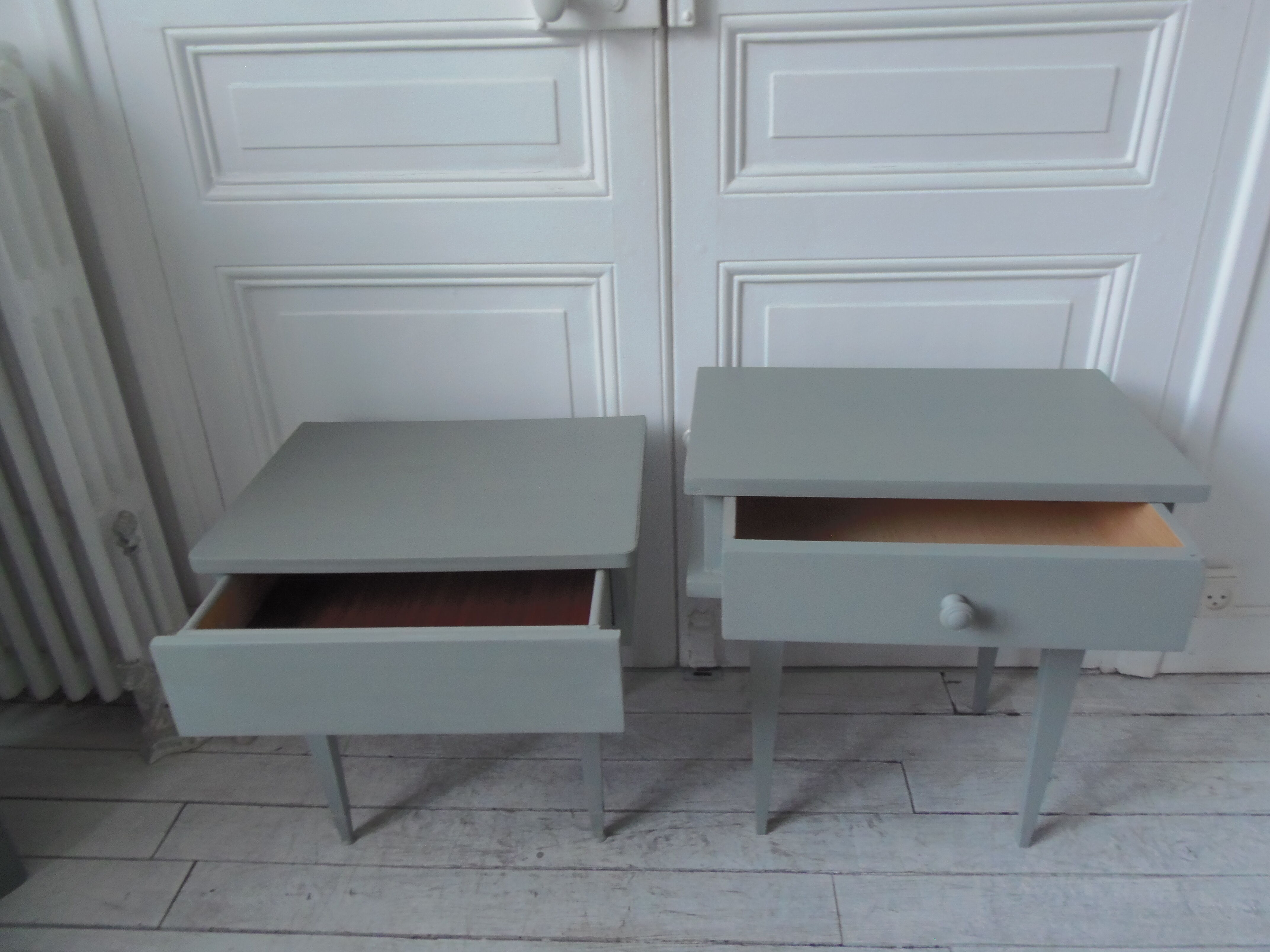 Duo of bedside tables, mismatched vintage sofa ends green of gray