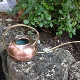 Red copper watering can in Scandinavian style 60s-70s
