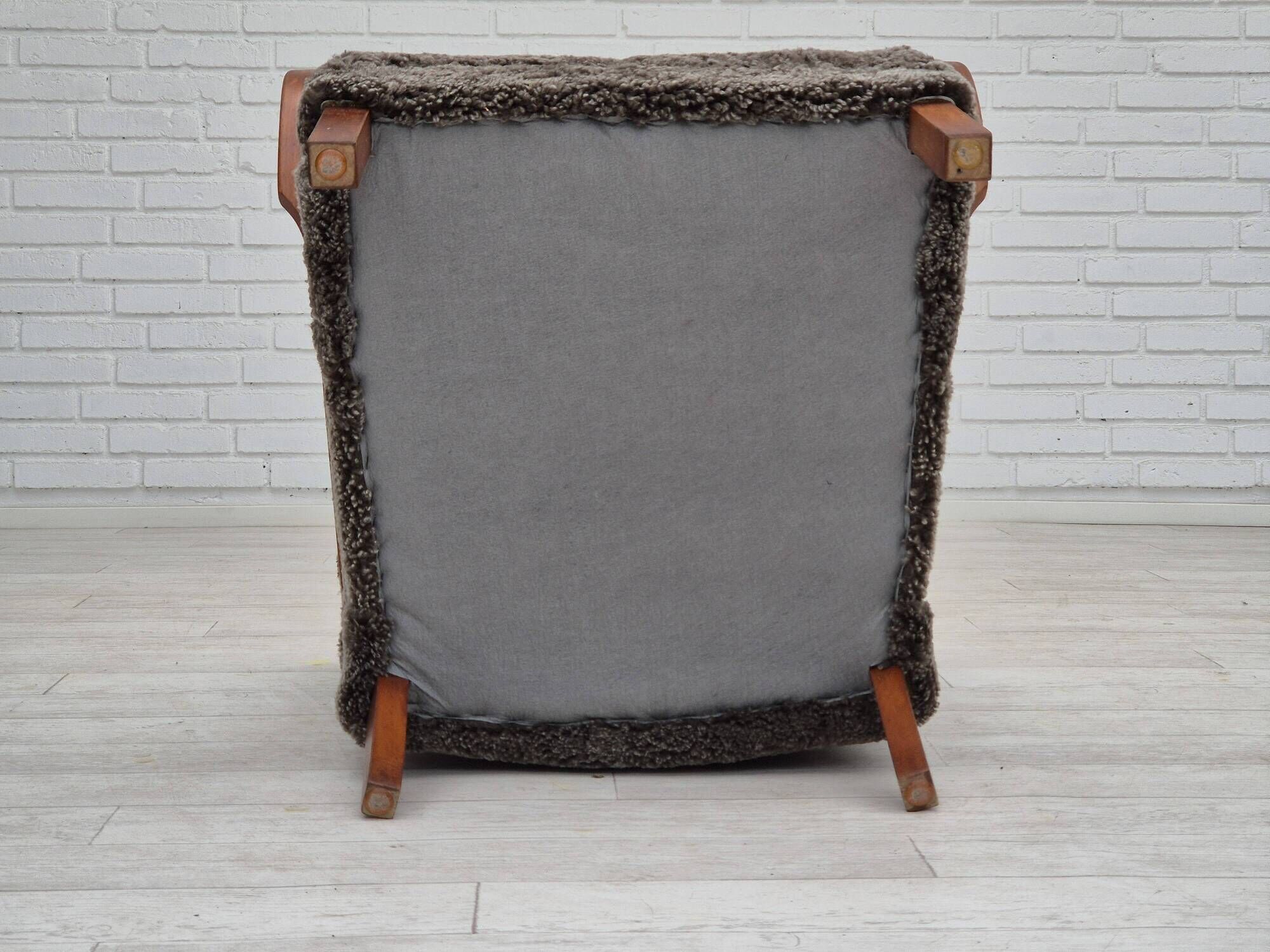 1950s, Danish design, reupholstered armchair, genuine sheepskin "Wellington".