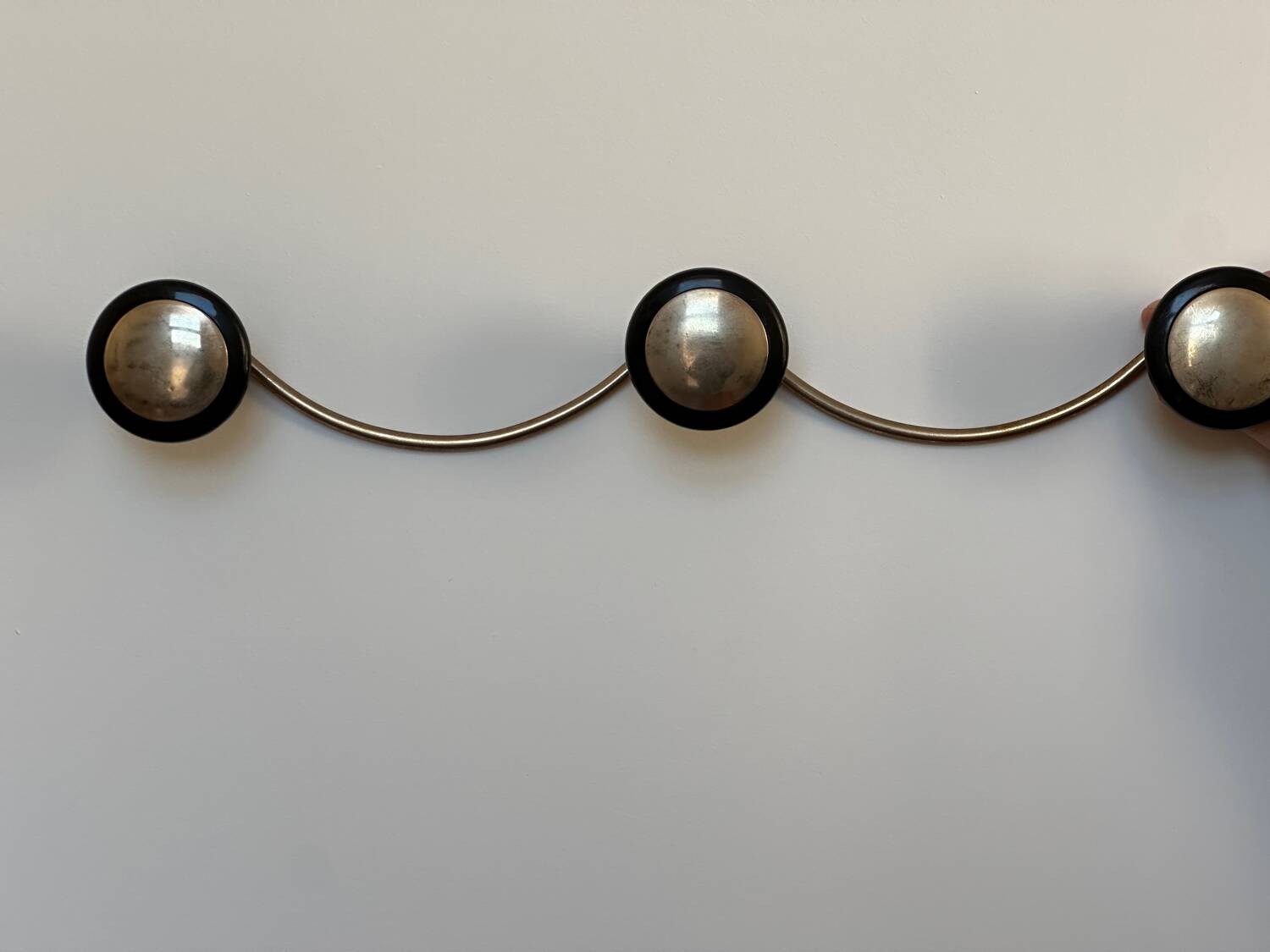 Wall mounted coat rack