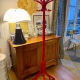 Red Baumann parrot coat rack