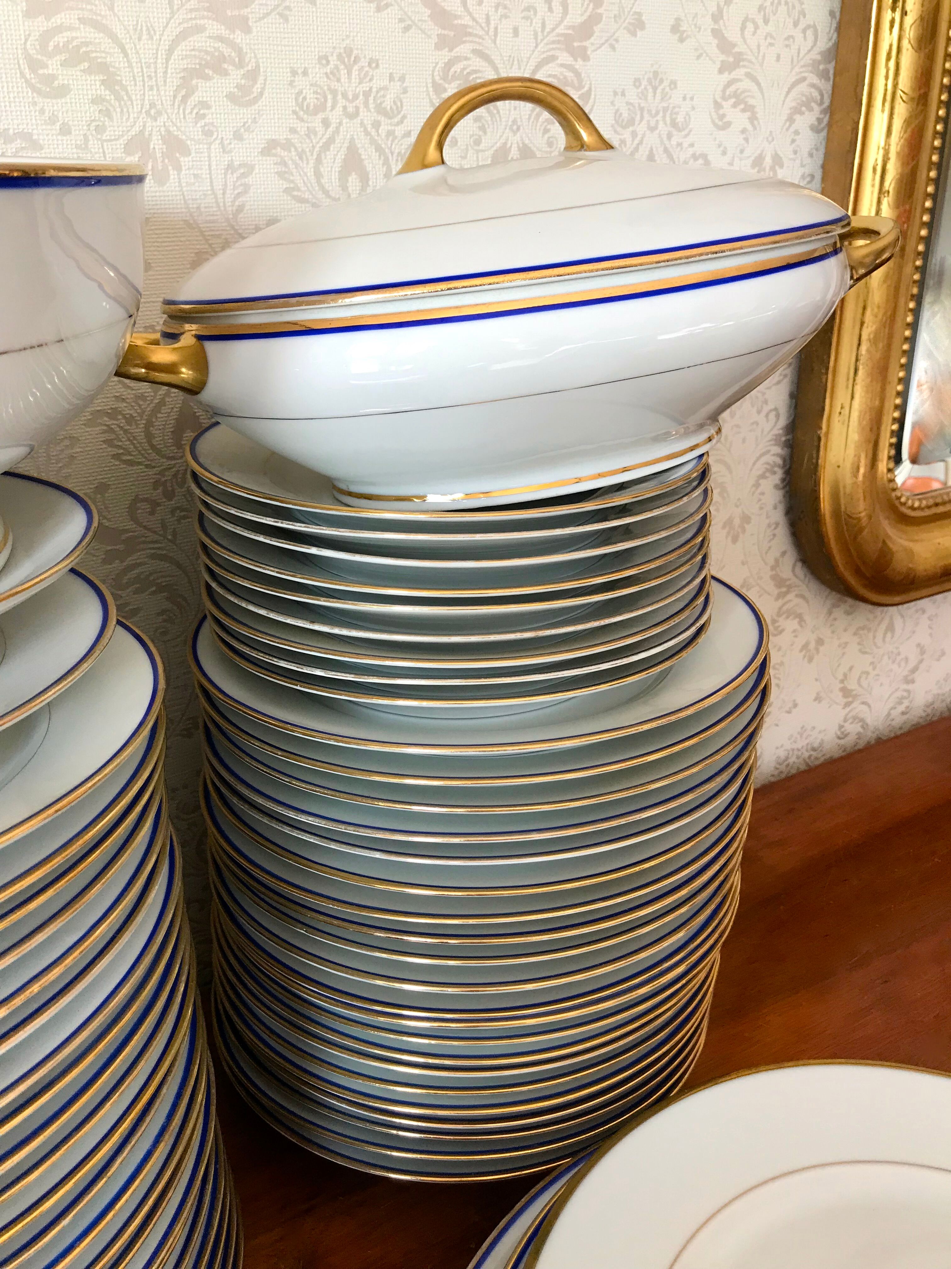 table service art deco limoges porcelain white border blue and gold 61 pieces signed