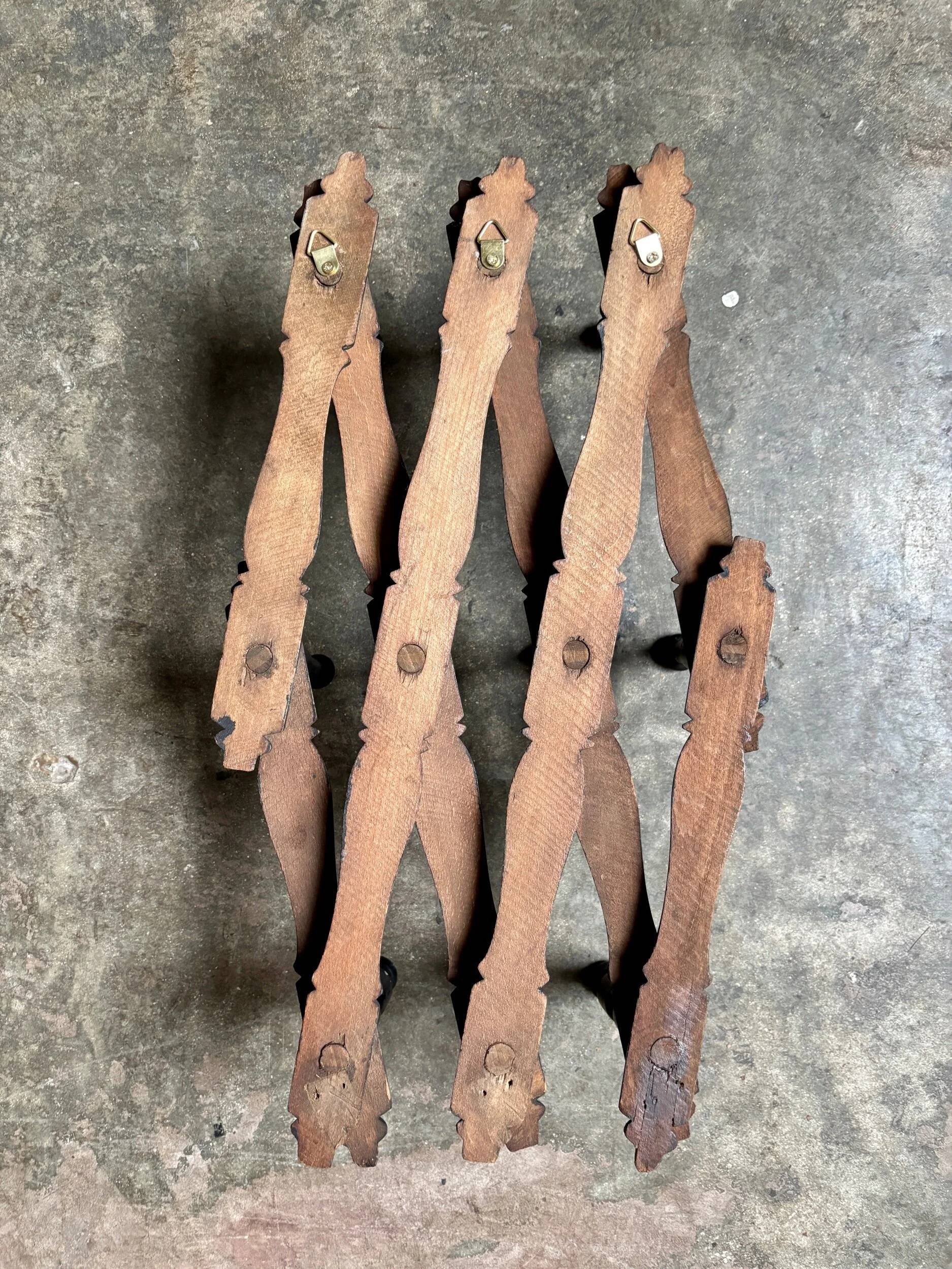 Napoleon III hinged wall-mounted coat rack in black wood