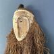 Long face tribal mask with narrow eye-holes