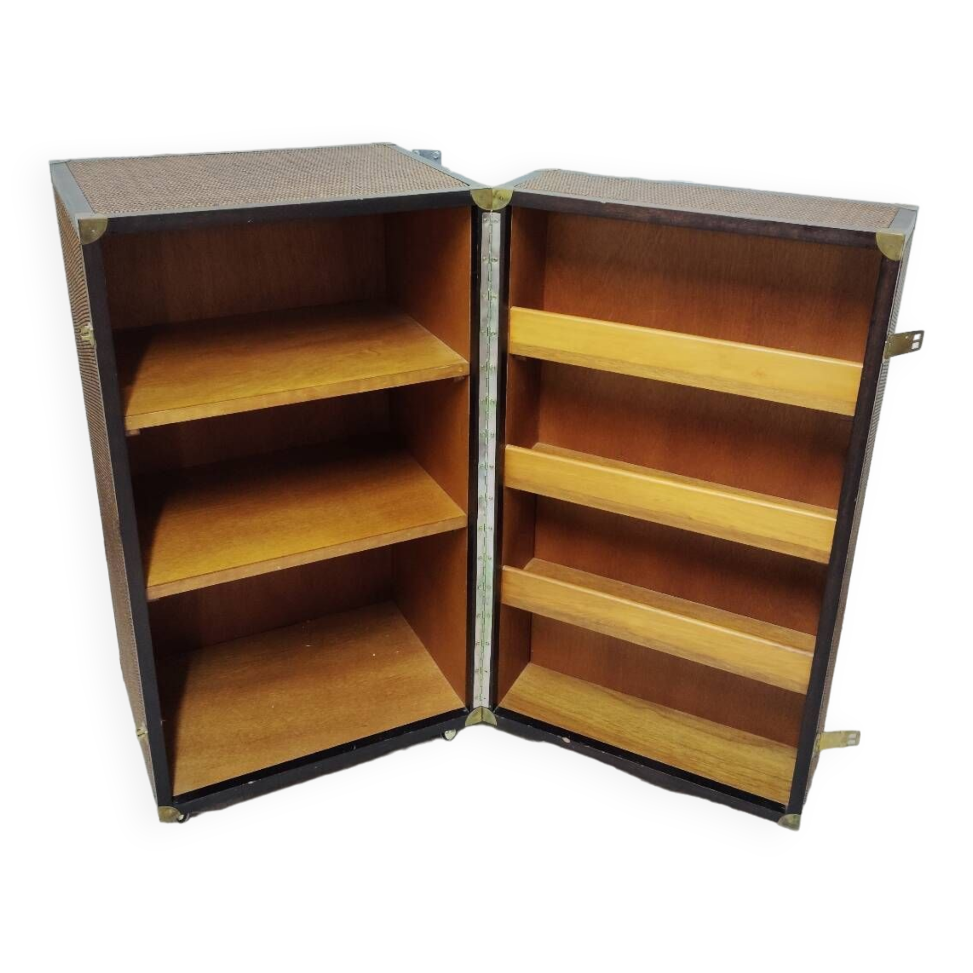 Wardrobe trunk on casters in mahogany and woven rattan.