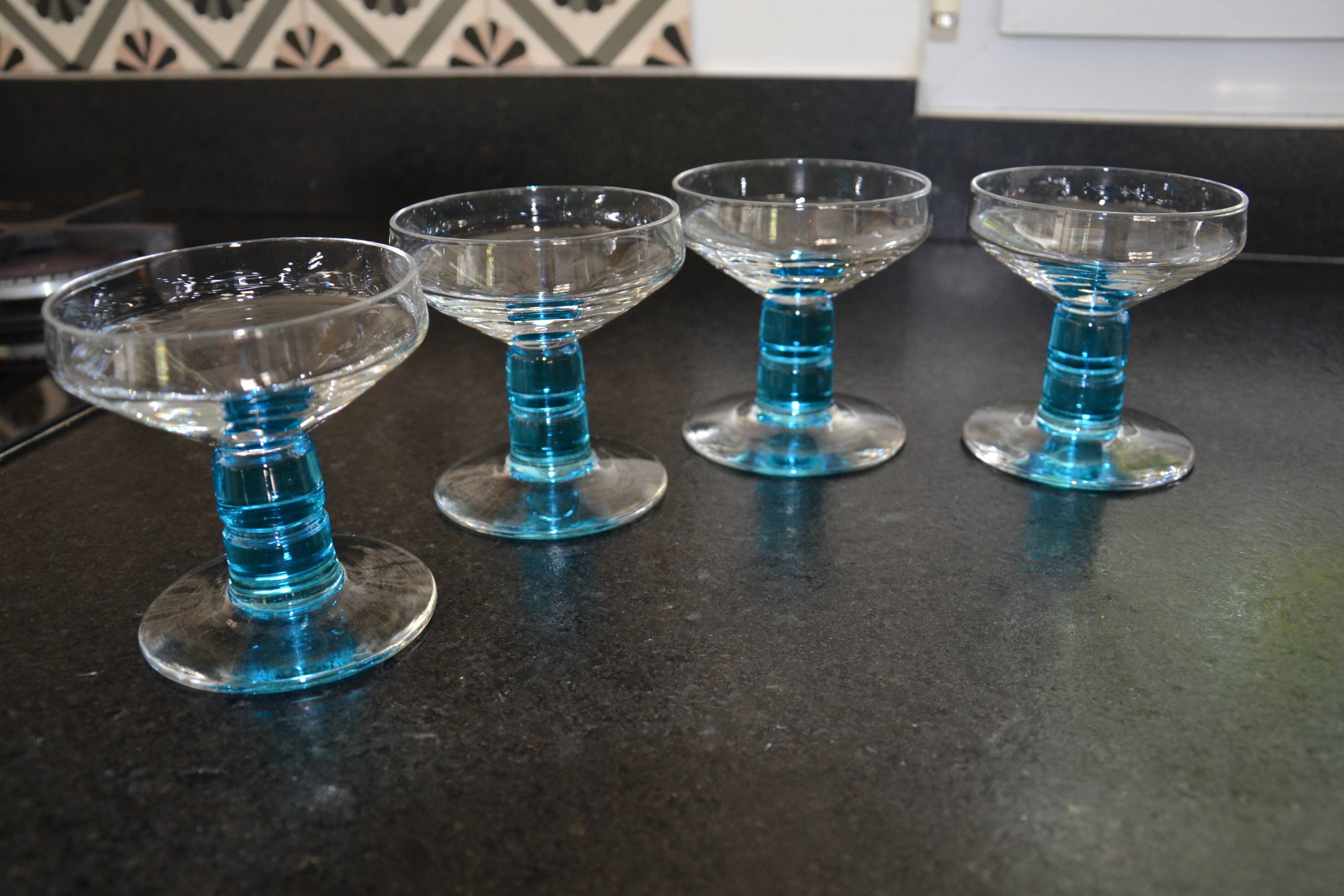 4 vintage blue footed champagne glasses
