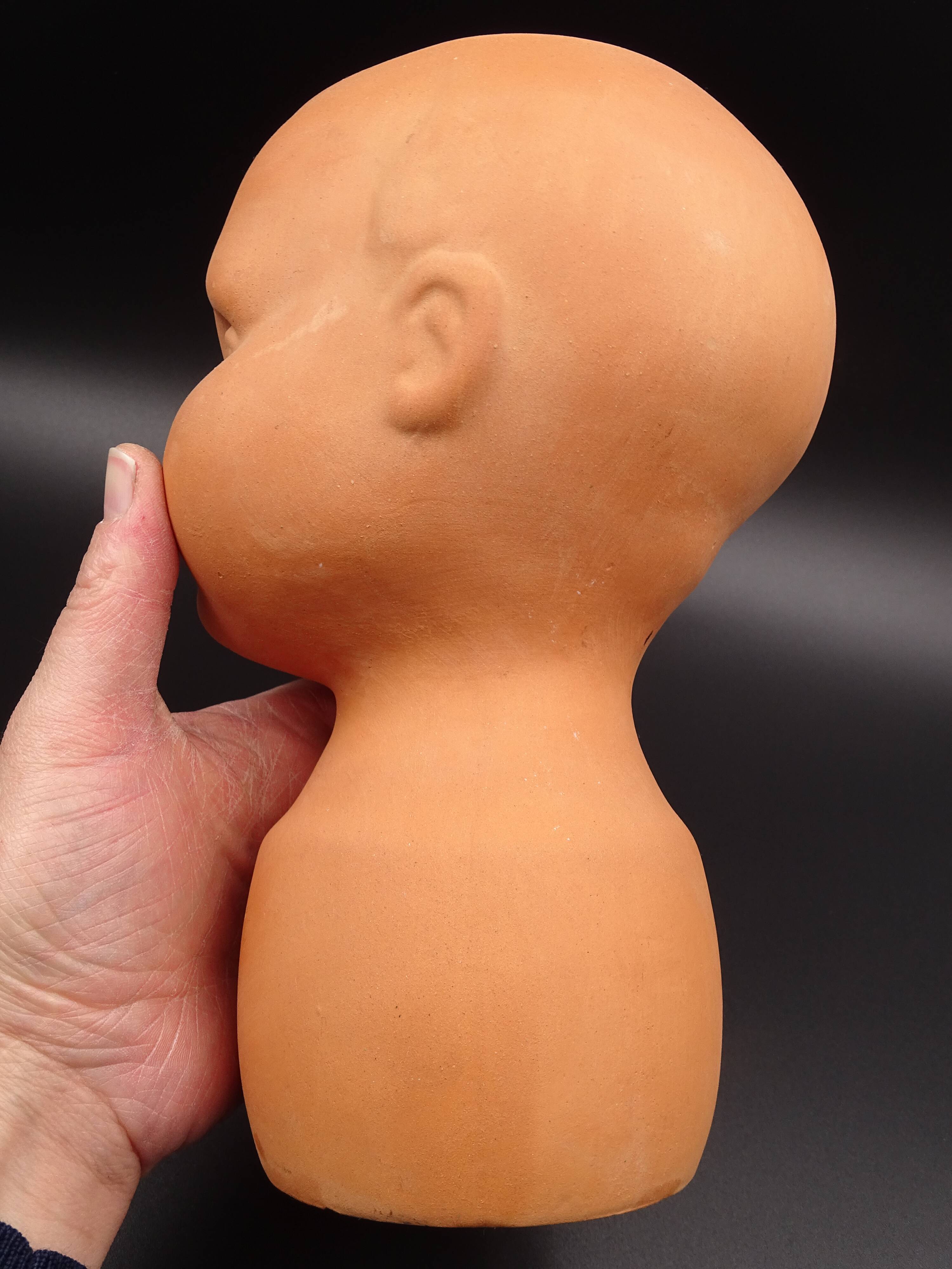 Vase in the shape of a baby's head - poupon