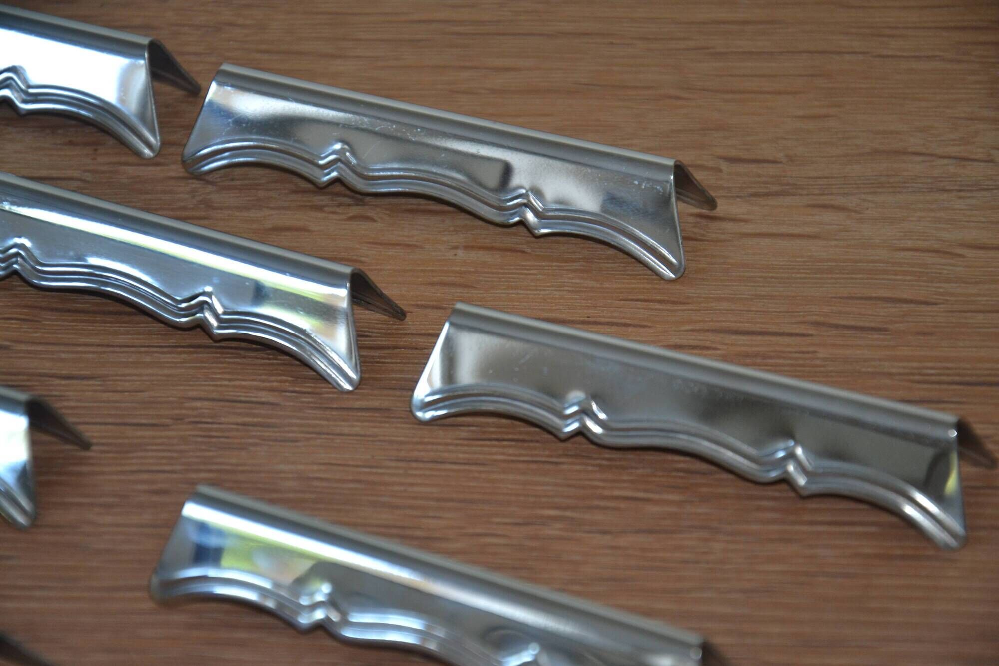 12 silver-plated knife rests