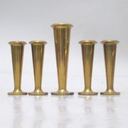 Five scandinavian brass candle holders 60s