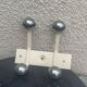 Industrial wall coat rack two hooks in white lacquered metal and vintage silver 1970