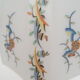 Old wall lamp 45° and its tulip lampshade decorated with flowers