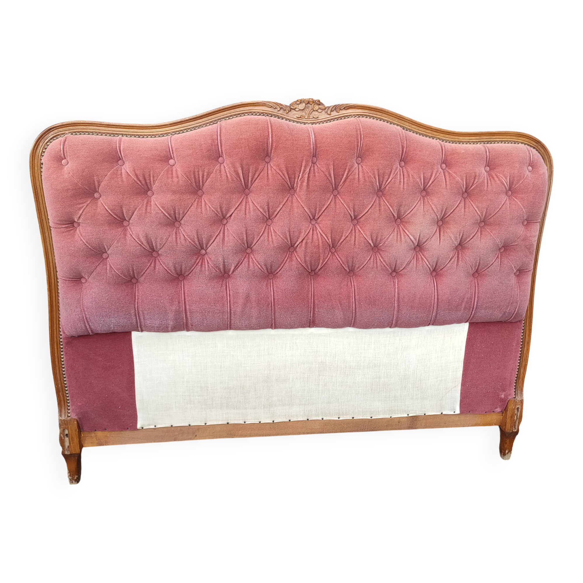 antique wooden and fabric headboard