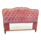 antique wooden and fabric headboard