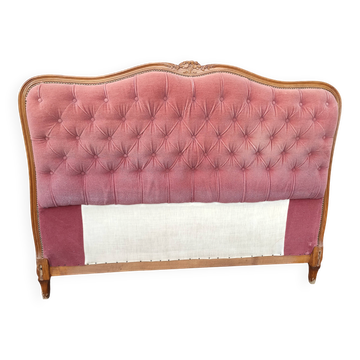 antique wooden and fabric headboard