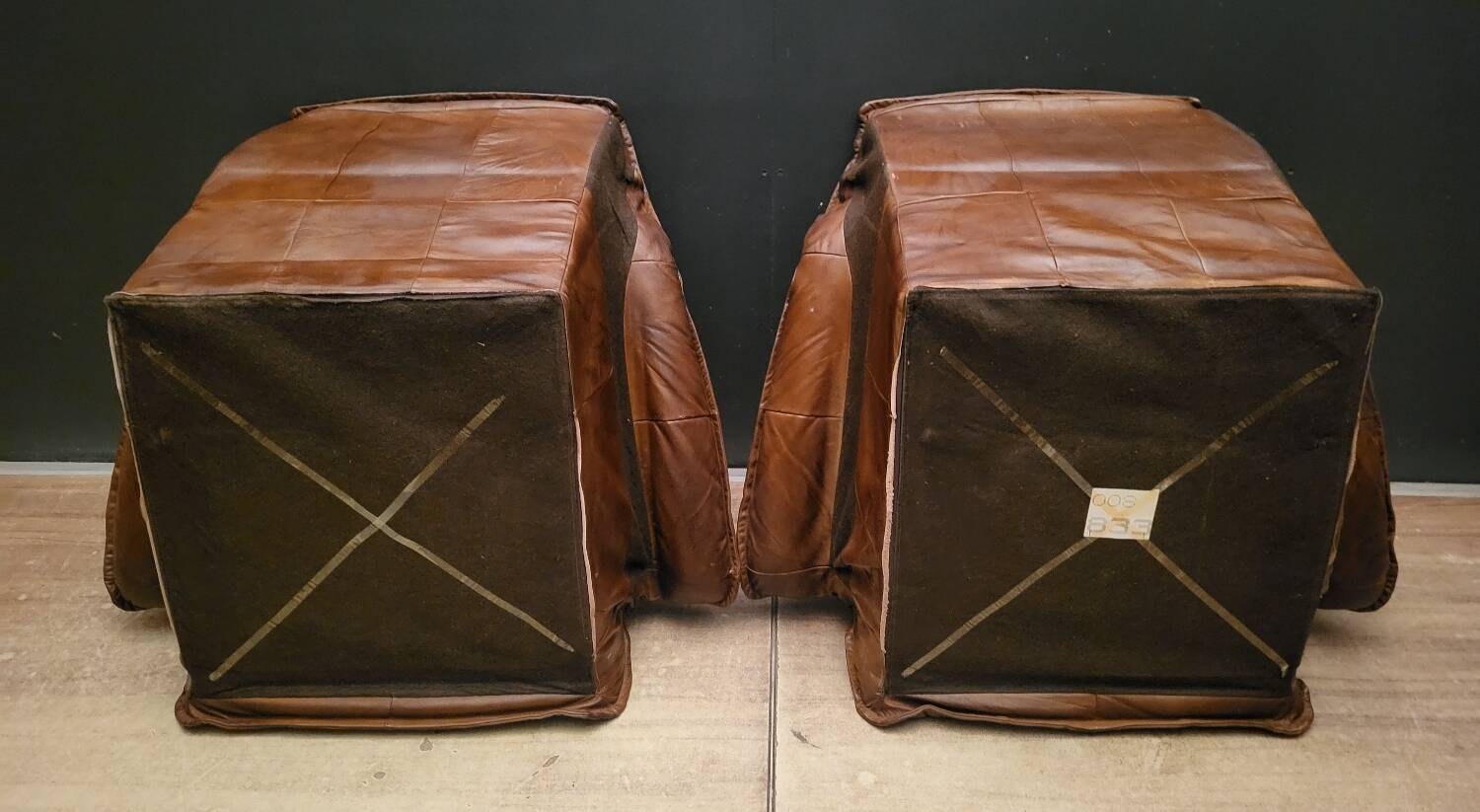 Pair of Vintage Brutalist armchairs from the 60s in leather and solid oak