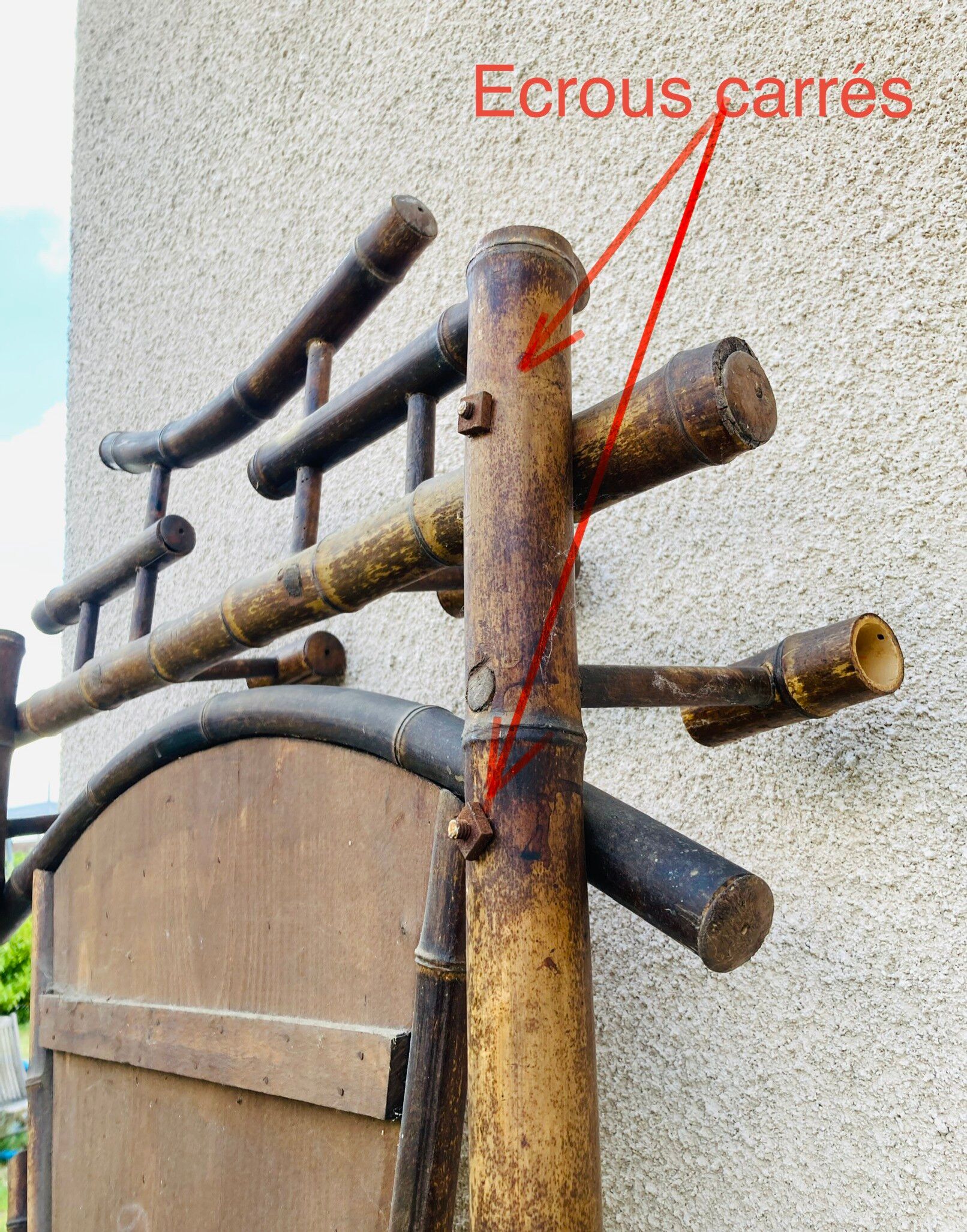 Bamboo coat rack from the 19th century, mirror in the shape of a crescent moon.