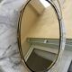 Vintage oval mirror plateau in gilded brass & black scoubidou — 1970s