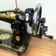 Singer - old sewing machine - black lacquer with golden patterns - very decorative