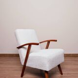 Vintage armchair in pearl white bouclé with walnut wood, 1960.