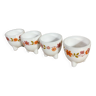 Series of 4 arcopal tripod egg cups