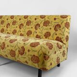 Bench with yellow and red floral fabric, France, circa 1960